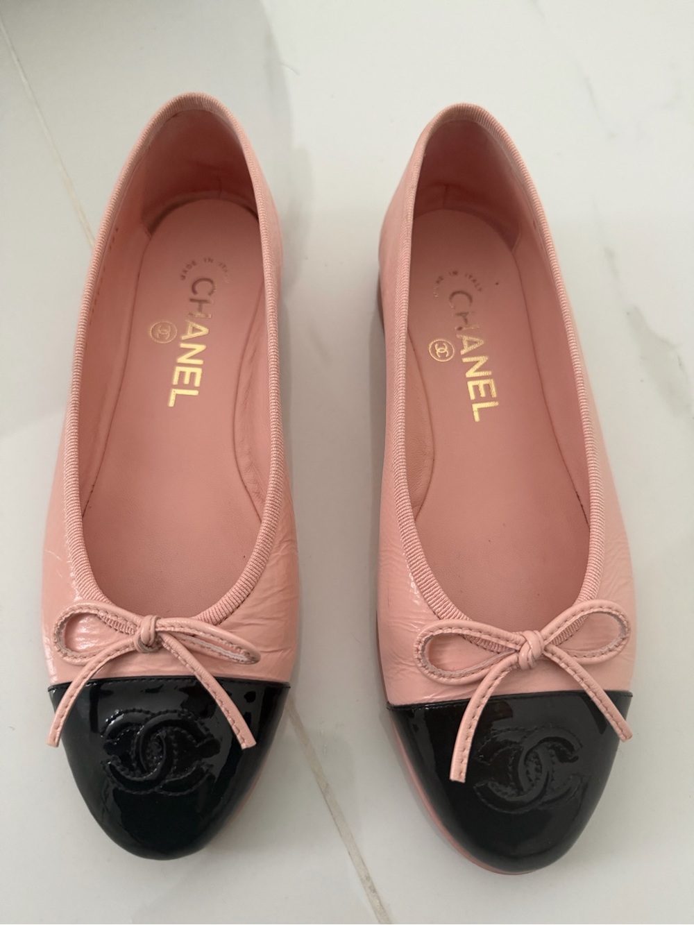 CHANEL Pink and Black Cap-Toe Leather Ballet Flats